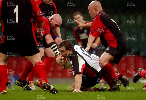 230405 - Glyncoch v Trefil - The Worthington Districts Cup Final -  Trefil's Dean Holvey goes to ground 