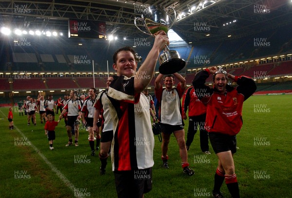 230405 - Glyncoch v Trefil - The Worthington Districts Cup Final -  Trefil captain David Kearney celebrates with the Worthington Districts Cup