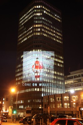 14.10.11 -  Good luck messages are projected onto the side Admiral's offices in Cardiff ahead of Wales' Rugby World Cup Semi Final against France 