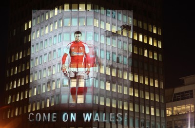 14.10.11 -  Good luck messages are projected onto the side Admiral's offices in Cardiff ahead of Wales' Rugby World Cup Semi Final against France 