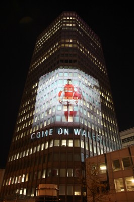 14.10.11 -  Good luck messages are projected onto the side Admiral's offices in Cardiff ahead of Wales' Rugby World Cup Semi Final against France 