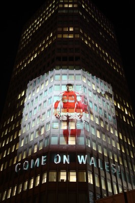 14.10.11 -  Good luck messages are projected onto the side Admiral's offices in Cardiff ahead of Wales' Rugby World Cup Semi Final against France 