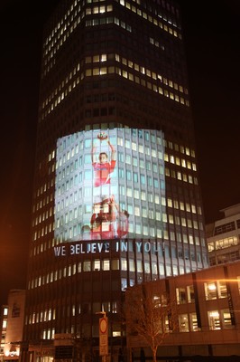 14.10.11 -  Good luck messages are projected onto the side Admiral's offices in Cardiff ahead of Wales' Rugby World Cup Semi Final against France 
