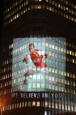14.10.11 -  Good luck messages are projected onto the side Admiral's offices in Cardiff ahead of Wales' Rugby World Cup Semi Final against France 