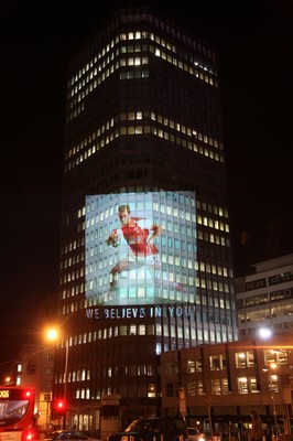 14.10.11 -  Good luck messages are projected onto the side Admiral's offices in Cardiff ahead of Wales' Rugby World Cup Semi Final against France 