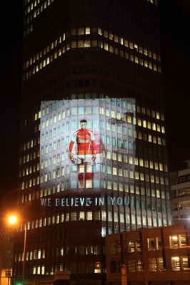 14.10.11 -  Good luck messages are projected onto the side Admiral's offices in Cardiff ahead of Wales' Rugby World Cup Semi Final against France 