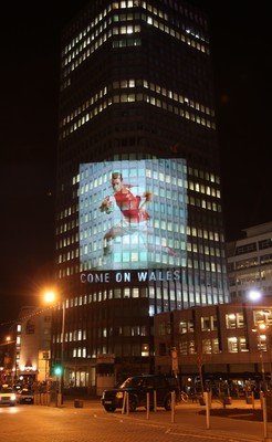 14.10.11 -  Good luck messages are projected onto the side Admiral's offices in Cardiff ahead of Wales' Rugby World Cup Semi Final against France 