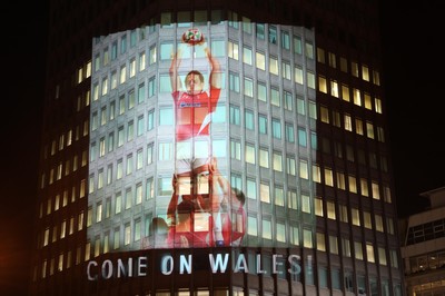 14.10.11 -  Good luck messages are projected onto the side Admiral's offices in Cardiff ahead of Wales' Rugby World Cup Semi Final against France 
