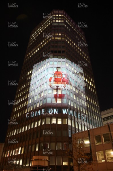 14.10.11 -  Good luck messages are projected onto the side Admiral's offices in Cardiff ahead of Wales' Rugby World Cup Semi Final against France 