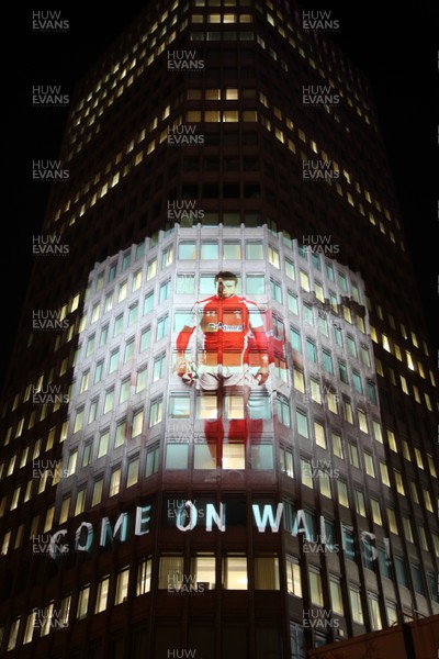 14.10.11 -  Good luck messages are projected onto the side Admiral's offices in Cardiff ahead of Wales' Rugby World Cup Semi Final against France 