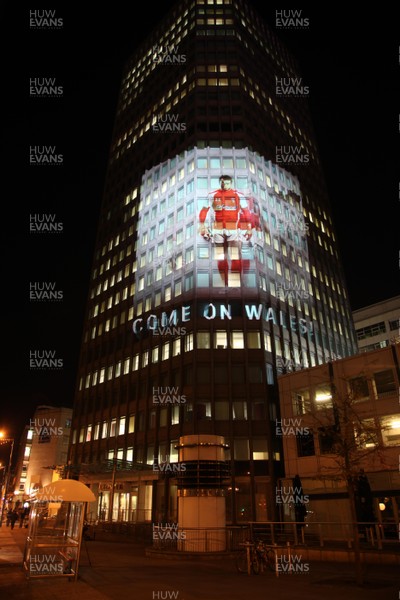 14.10.11 -  Good luck messages are projected onto the side Admiral's offices in Cardiff ahead of Wales' Rugby World Cup Semi Final against France 