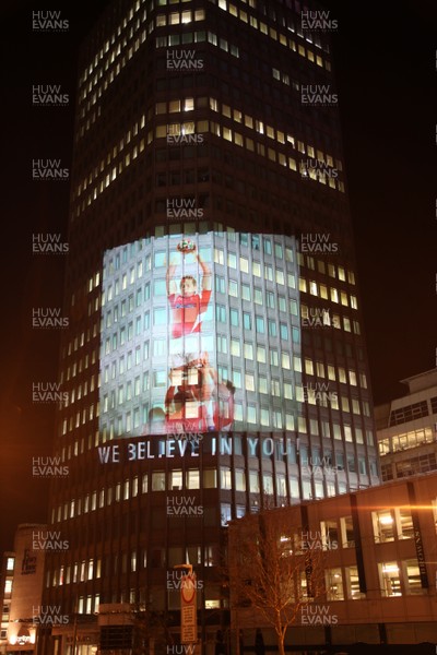 14.10.11 -  Good luck messages are projected onto the side Admiral's offices in Cardiff ahead of Wales' Rugby World Cup Semi Final against France 