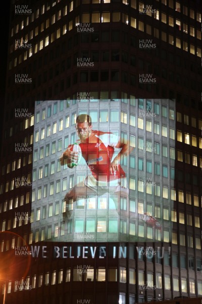 14.10.11 -  Good luck messages are projected onto the side Admiral's offices in Cardiff ahead of Wales' Rugby World Cup Semi Final against France 