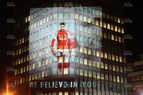 14.10.11 -  Good luck messages are projected onto the side Admiral's offices in Cardiff ahead of Wales' Rugby World Cup Semi Final against France 