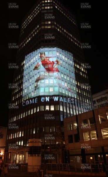 14.10.11 -  Good luck messages are projected onto the side Admiral's offices in Cardiff ahead of Wales' Rugby World Cup Semi Final against France 