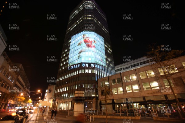 14.10.11 -  Good luck messages are projected onto the side Admiral's offices in Cardiff ahead of Wales' Rugby World Cup Semi Final against France 