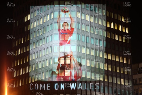 14.10.11 -  Good luck messages are projected onto the side Admiral's offices in Cardiff ahead of Wales' Rugby World Cup Semi Final against France 