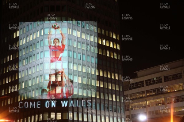 14.10.11 -  Good luck messages are projected onto the side Admiral's offices in Cardiff ahead of Wales' Rugby World Cup Semi Final against France 