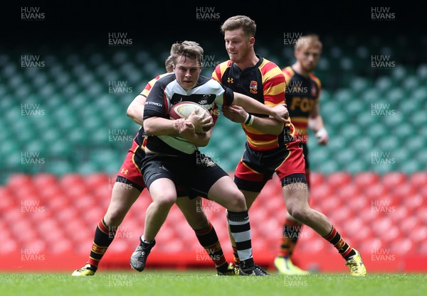 230416 - WRU - Plate Final - Gowerton Youth v Brynmawr Youth - Kieran Charles is tackled by Oliver Richards and Matthew Cross of Brynmawr