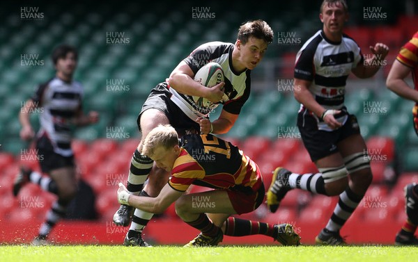 230416 - WRU - Plate Final - Gowerton Youth v Brynmawr Youth - Callum Carsen of Gowerton is tackled by William Kershaw of Brynmawr