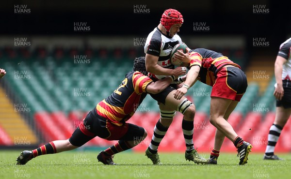 230416 - WRU - Plate Final - Gowerton Youth v Brynmawr Youth - Jordan Sherman of Gowerton is tackled by Cory Lewis and Brandon Isaac of Brynmawr