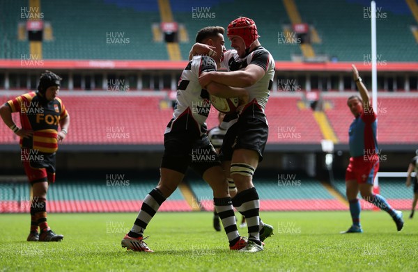 230416 - WRU - Plate Final - Gowerton Youth v Brynmawr Youth - Nathan Williams of Gowerton celebrates scoring a try with Jordan Sherman