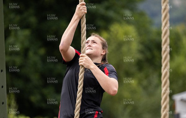 150722 - Wales Women’s rugby squad training session at The Green Mile, Cardiff - Caitlin Lewis takes on the rope climb