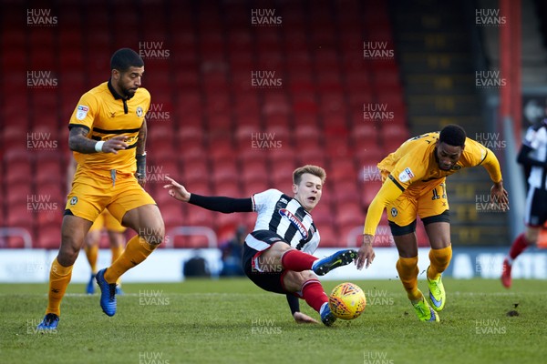 020219 - Grimsby Town v Newport County - Sky Bet League 2  Grimsby's Jake Hessenthaler clears the ball from County's Jamille Matt