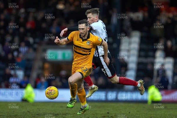 020219 - Grimsby Town v Newport County - Sky Bet League 2 -  Newports Andrew Crofts beats Grimsby's Ludvig Ohman