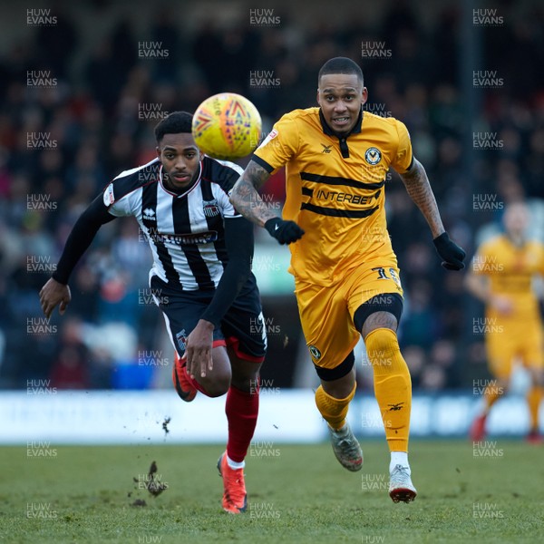 020219 - Grimsby Town v Newport County - Sky Bet League 2 -  Grimsby's Reece Hall-Johnson and Newport's Keanu Marsh-Brown chase down the ball
