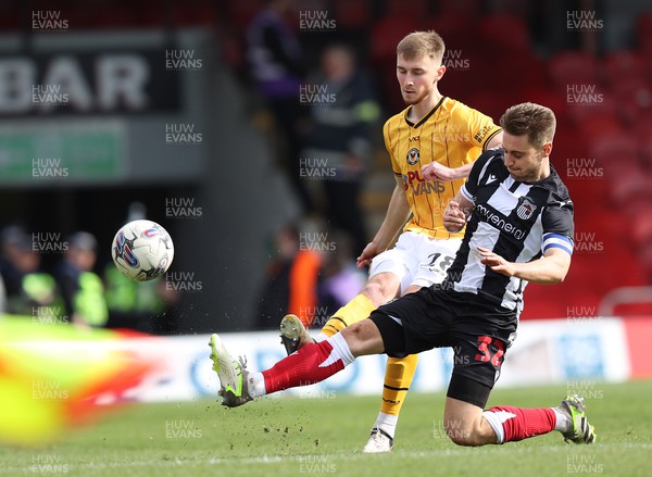 060424 - Grimsby Town v Newport County - Sky Bet League 2 - Danny Rose of Grimsby Town takes away from Matt Baker of Newport
