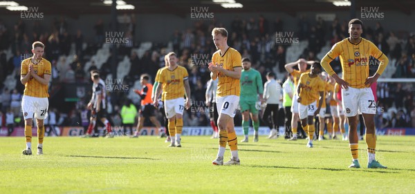 060424 - Grimsby Town v Newport County - Sky Bet League 2 - Newport County applaud the travelling fans