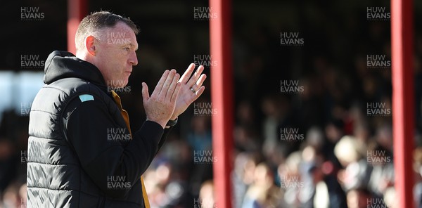 060424 - Grimsby Town v Newport County - Sky Bet League 2 - Manager Graham Coughlan of Newport County applauds the travelling fans
