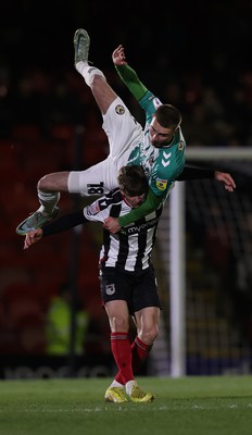 070323 - Grimsby Town v Newport County - Sky Bet League 2 - Matt Baker of Newport County and George Lloyd of Grimsby Town