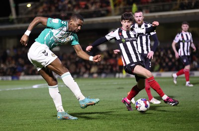 070323 - Grimsby Town v Newport County - Sky Bet League 2 - Omar Bogle of Newport County tries a shot on goal but blocked by Anthony Glennon of Grimsby Town