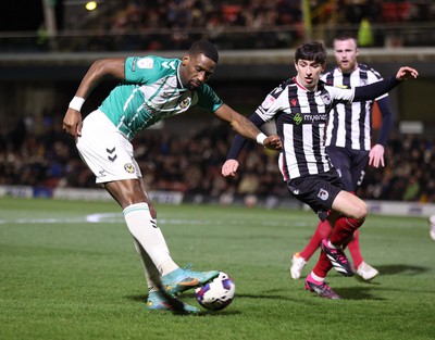 070323 - Grimsby Town v Newport County - Sky Bet League 2 - Omar Bogle of Newport County tries a shot on goal but blocked by Anthony Glennon of Grimsby Town