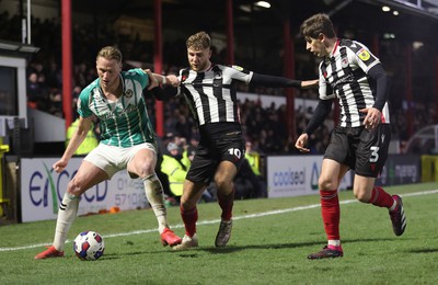 070323 - Grimsby Town v Newport County - Sky Bet League 2 - John McAtee of Grimsby Town and Anthony Glennon of Grimsby Town gang up on Hayden Lindley of Newport County