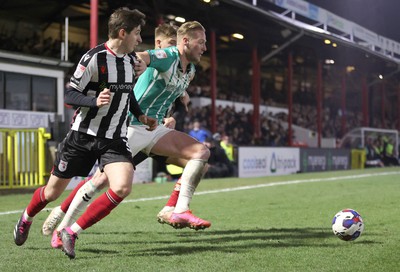 070323 - Grimsby Town v Newport County - Sky Bet League 2 - John McAtee of Grimsby Town and Anthony Glennon of Grimsby Town gang up on Hayden Lindley of Newport County