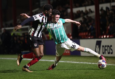 070323 - Grimsby Town v Newport County - Sky Bet League 2 - Calum Kavanagh of Newport County and Lichee Efete of Grimsby Town