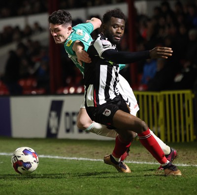 070323 - Grimsby Town v Newport County - Sky Bet League 2 - Calum Kavanagh of Newport County and Lichee Efete of Grimsby Town