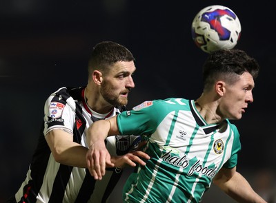 070323 - Grimsby Town v Newport County - Sky Bet League 2 - Calum Kavanagh of Newport County and Luke Waterfall of Grimsby Town