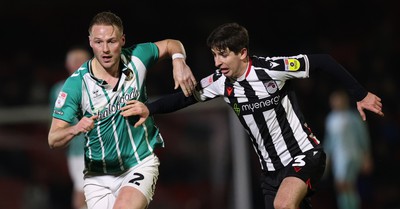 070323 - Grimsby Town v Newport County - Sky Bet League 2 - Cameron Norman of Newport County and Anthony Glennon of Grimsby Town