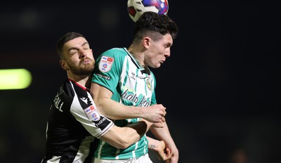 070323 - Grimsby Town v Newport County - Sky Bet League 2 - Calum Kavanagh of Newport County and Luke Waterfall of Grimsby Town