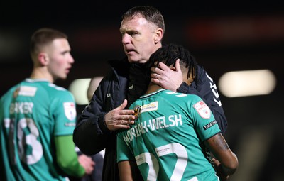 070323 - Grimsby Town v Newport County - Sky Bet League 2 - Manager Graham Coughlan of Newport County hugs Nathan Moriah-Welsh of Newport County at the end of the match