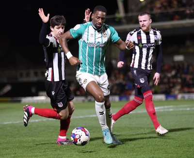 070323 - Grimsby Town v Newport County - Sky Bet League 2 - Omar Bogle of Newport County tries to run through Anthony Glennon of Grimsby Town