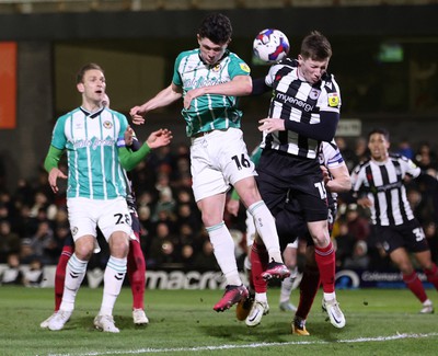 070323 - Grimsby Town v Newport County - Sky Bet League 2 - Calum Kavanagh of Newport County and John McAtee of Grimsby Town