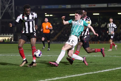 070323 - Grimsby Town v Newport County - Sky Bet League 2 - Calum Kavanagh of Newport County tries a shot on goal followed by Josh Emmanuel of Grimsby Town