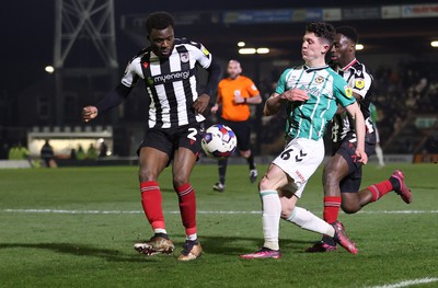 070323 - Grimsby Town v Newport County - Sky Bet League 2 - Calum Kavanagh of Newport County tries a shot on goal followed by Josh Emmanuel of Grimsby Town and Lichee Efete of Grimsby Town