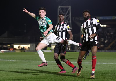 070323 - Grimsby Town v Newport County - Sky Bet League 2 - Calum Kavanagh of Newport County tries a shot on goal followed by Josh Emmanuel of Grimsby Town and Lichee Efete of Grimsby Town