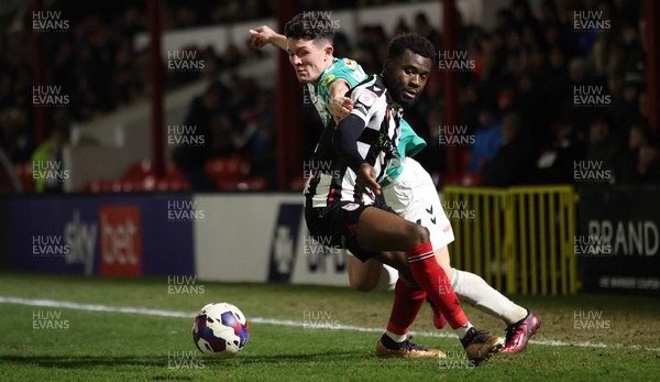 070323 - Grimsby Town v Newport County - Sky Bet League 2 - Calum Kavanagh of Newport County and Lichee Efete of Grimsby Town